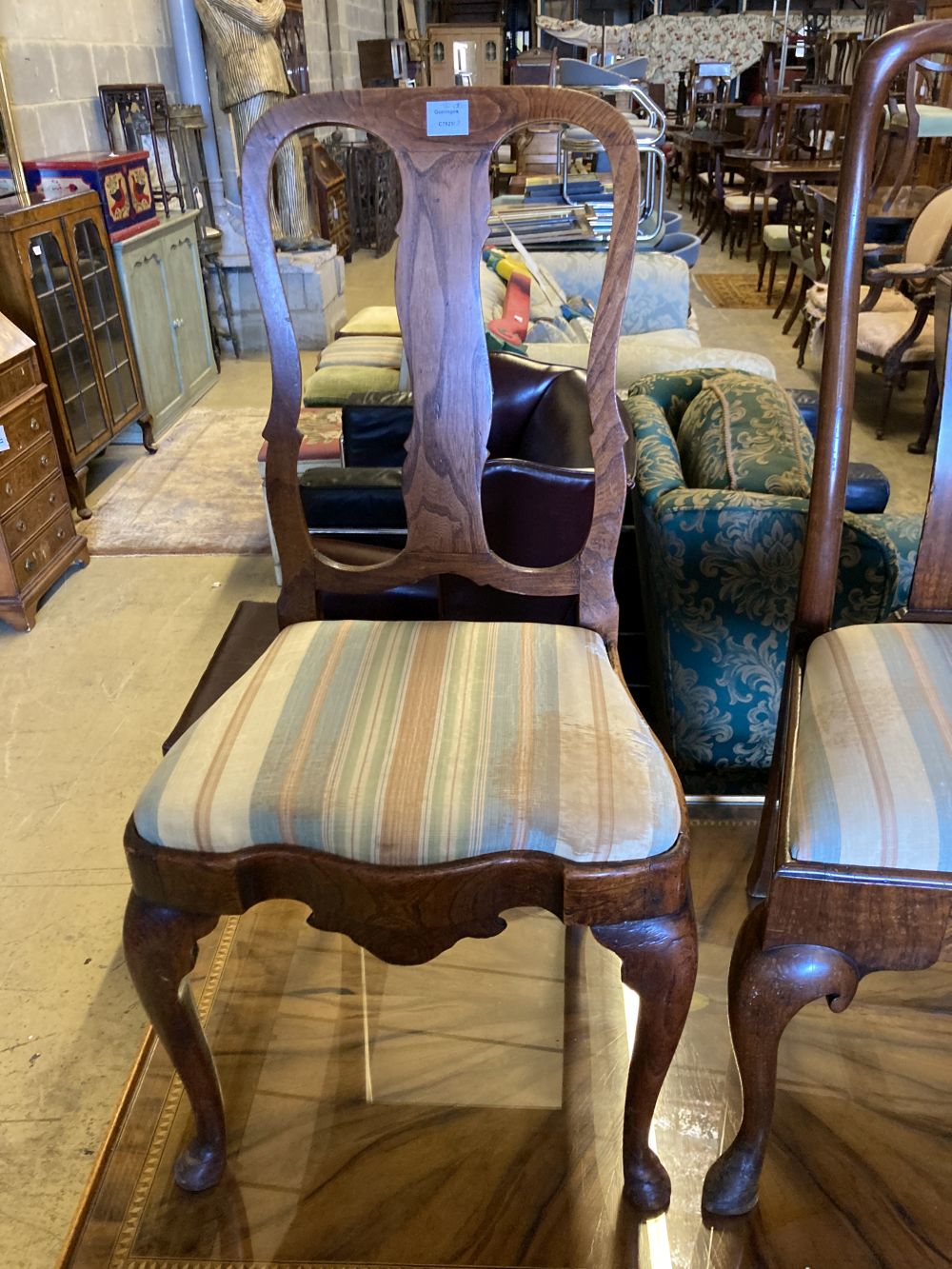 Two early 18th century walnut dining chairs